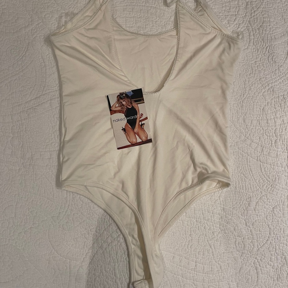 Naked wardrobe white thong bodysuit